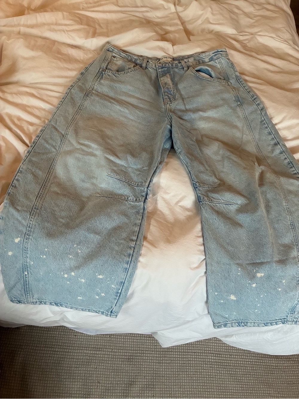 We The Free Light Wash Blue Barrel Leg Jeans with Paint Splatter
